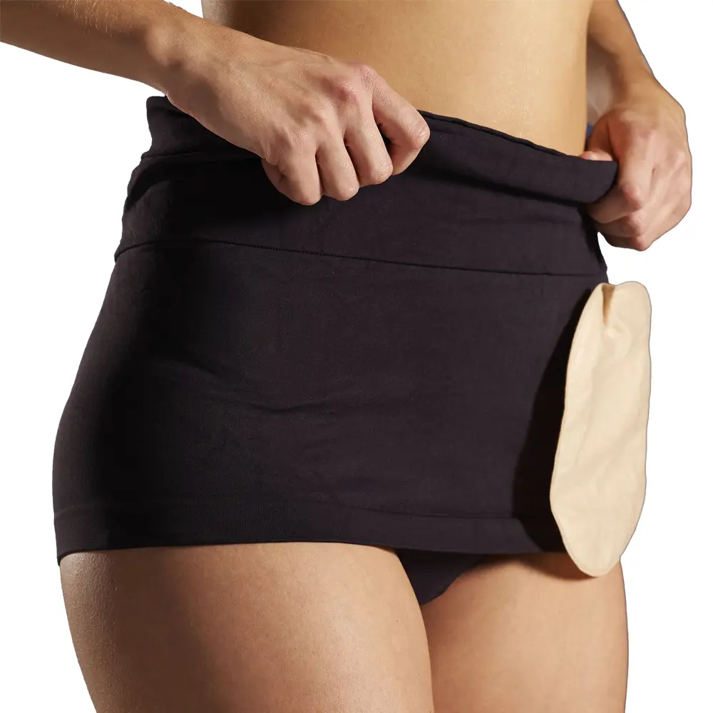 StomaSafe Plus in black, worn on model